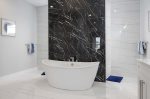 Soaking Tub with Marble Access Wall and Walk Around Shower